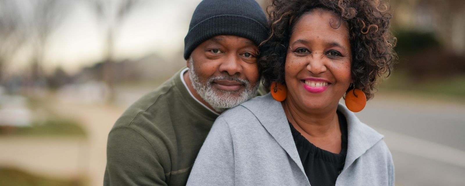 Older Black Couple In Fall Clothes